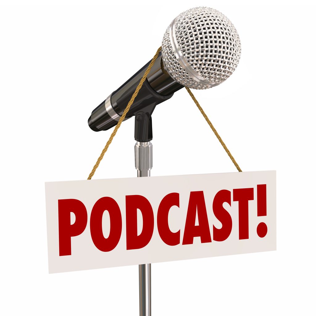 Podcast word on a sign hanging on a microphone for a forum, show or interview audio program